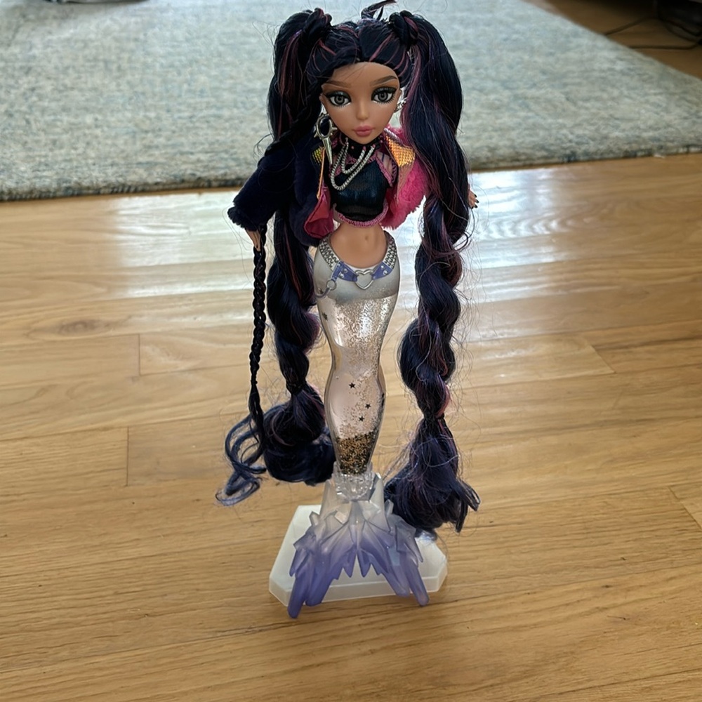 Mermaid doll with water, glittery tail